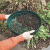 Garden Riddle in Use Garden riddle soil sieve being used to sieve soil