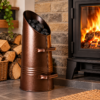 Metal Coal Hod - Fireplace Lifestyle Bronze metal coal hod beside a wood burning stove